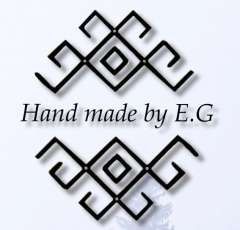 Hand made by E.G.