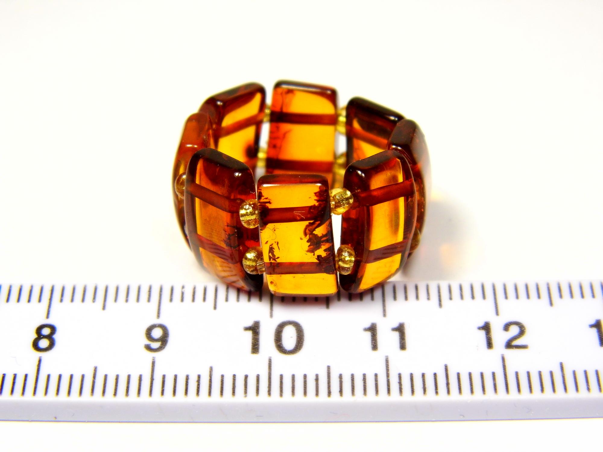 Gintarinis žiedas ant gumytės. Dydis 17.5mm. Žiedas su gintaru. Rudo skaidraus konjako gintaro žiedas. Natūralus Baltijos gintaras. 0412
