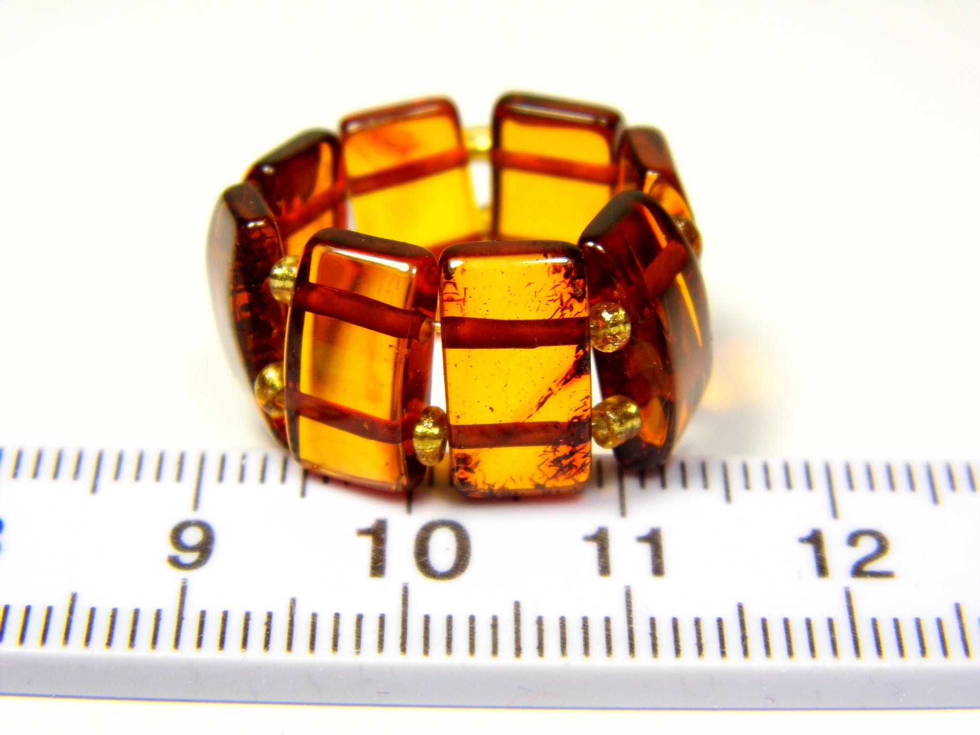 Gintarinis žiedas ant gumytės. Dydis 17.5mm. Žiedas su gintaru. Rudo skaidraus konjako gintaro žiedas. Natūralus Baltijos gintaras. 0412