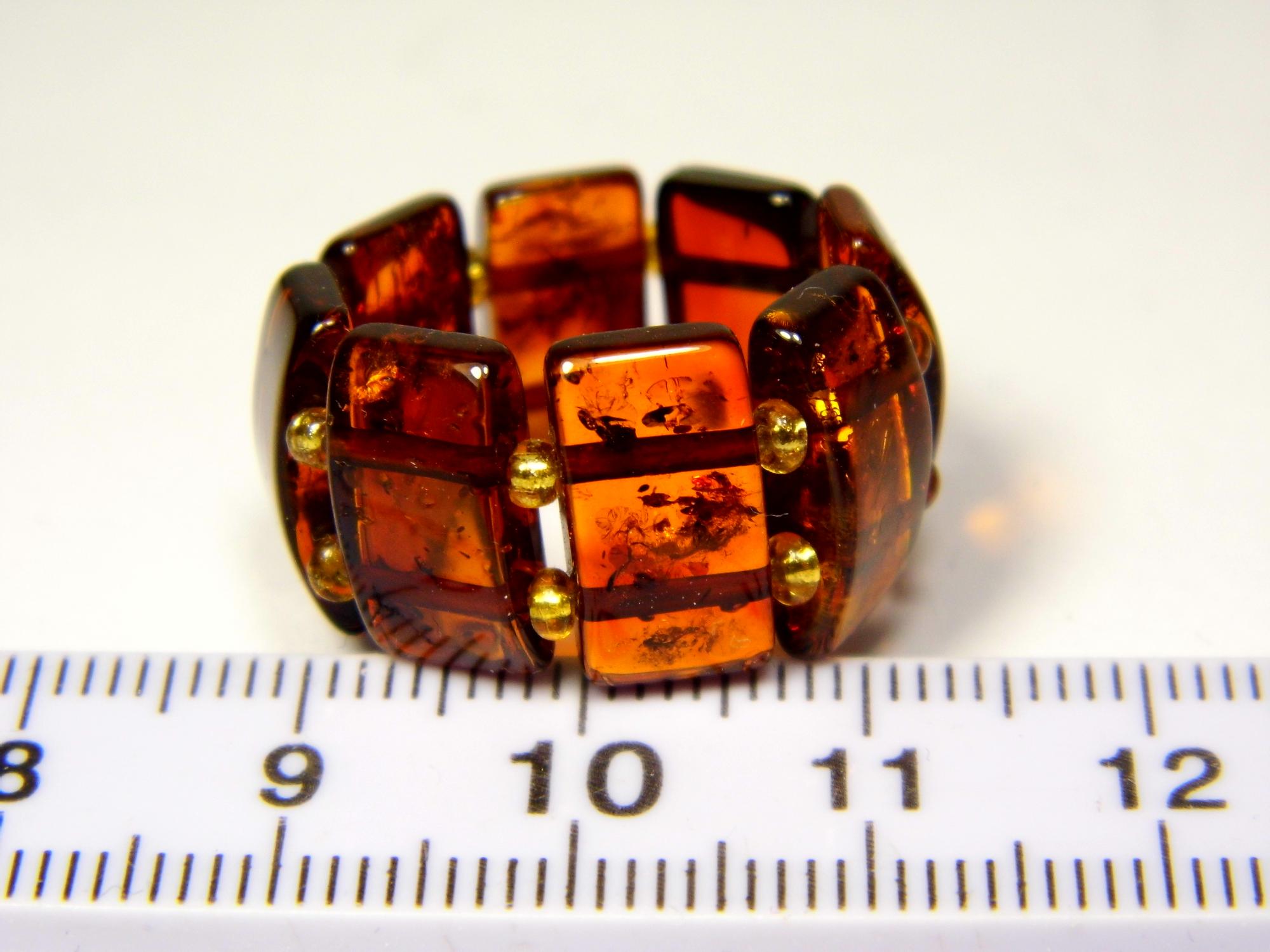 Gintarinis žiedas ant gumytės. Dydis 18mm. Žiedas su gintaru. Rudo skaidraus konjako gintaro žiedas. Natūralus Baltijos gintaras. 0413