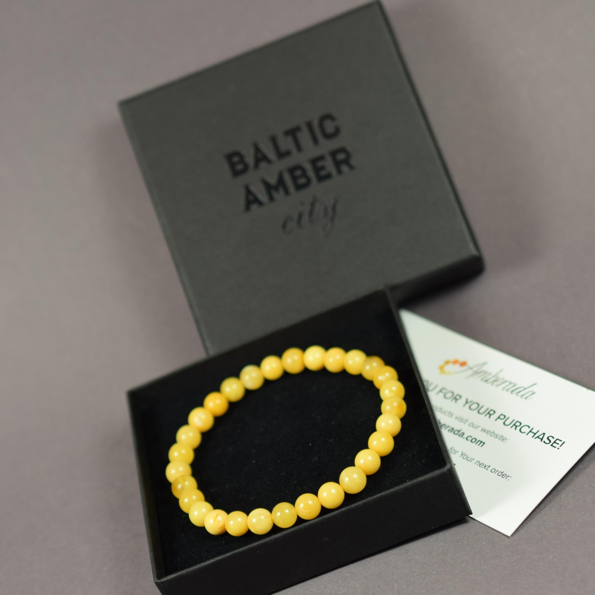 Geltona gintarinė apyrankė iš apvaliu rutuliukų AB0140