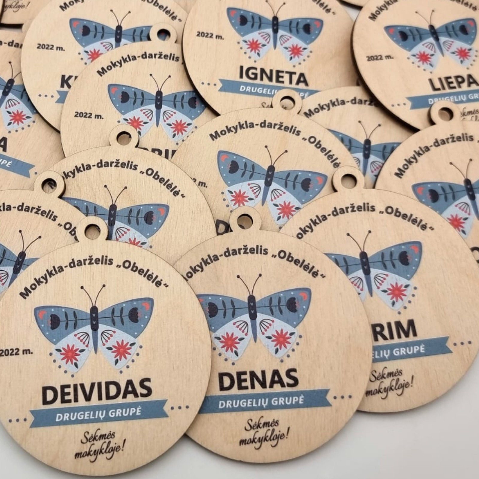 Darželio išleistuvių suvenyras - medaliai: įvairūs vabaliukai, boruželės, bitutės, drugeliai, skruzdėliukai ir kt.