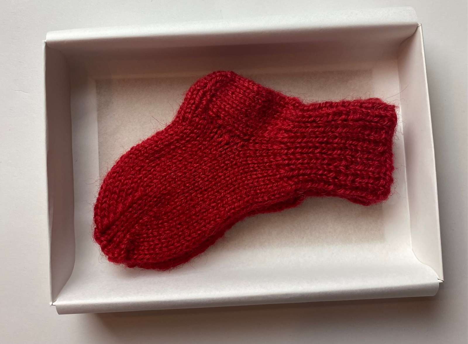 Pirmosios kūdikio kojinaitės (10 cm)