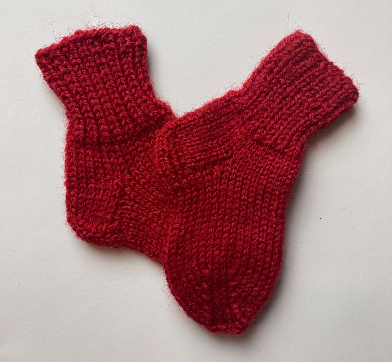 Pirmosios kūdikio kojinaitės (10 cm)