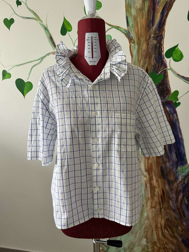Langeliai perkurti marškiniai Langeliai perkurti marškiniai